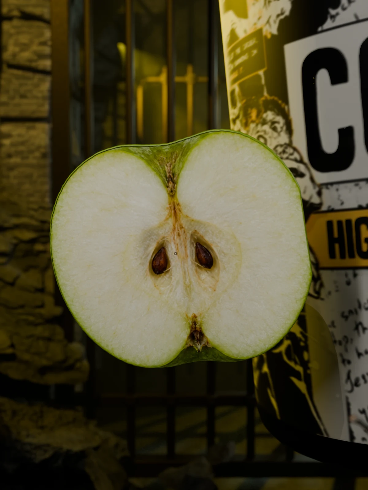 Pear flesh, skin and seeds beside the Convict product