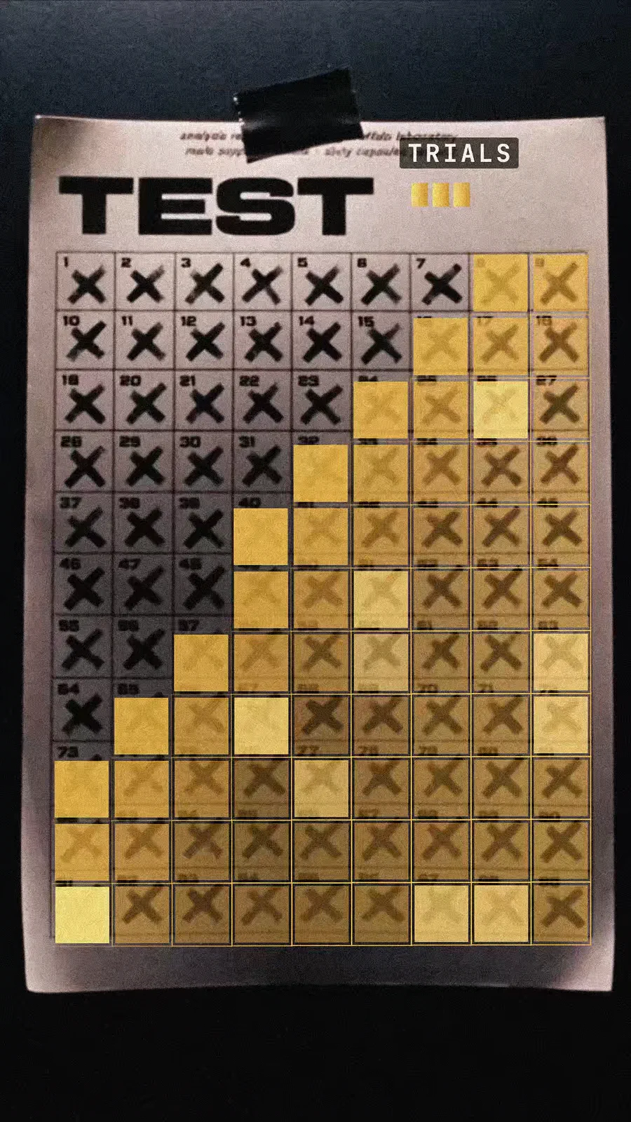 A TEST trials sheet taped to the wall, rows of crossed-out boxes turning gold.