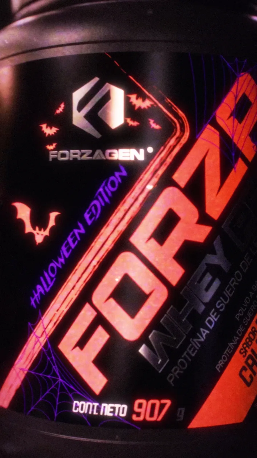 Macro pass across the Forzawhey Pro Halloween Edition label with neon bats and spider webs.