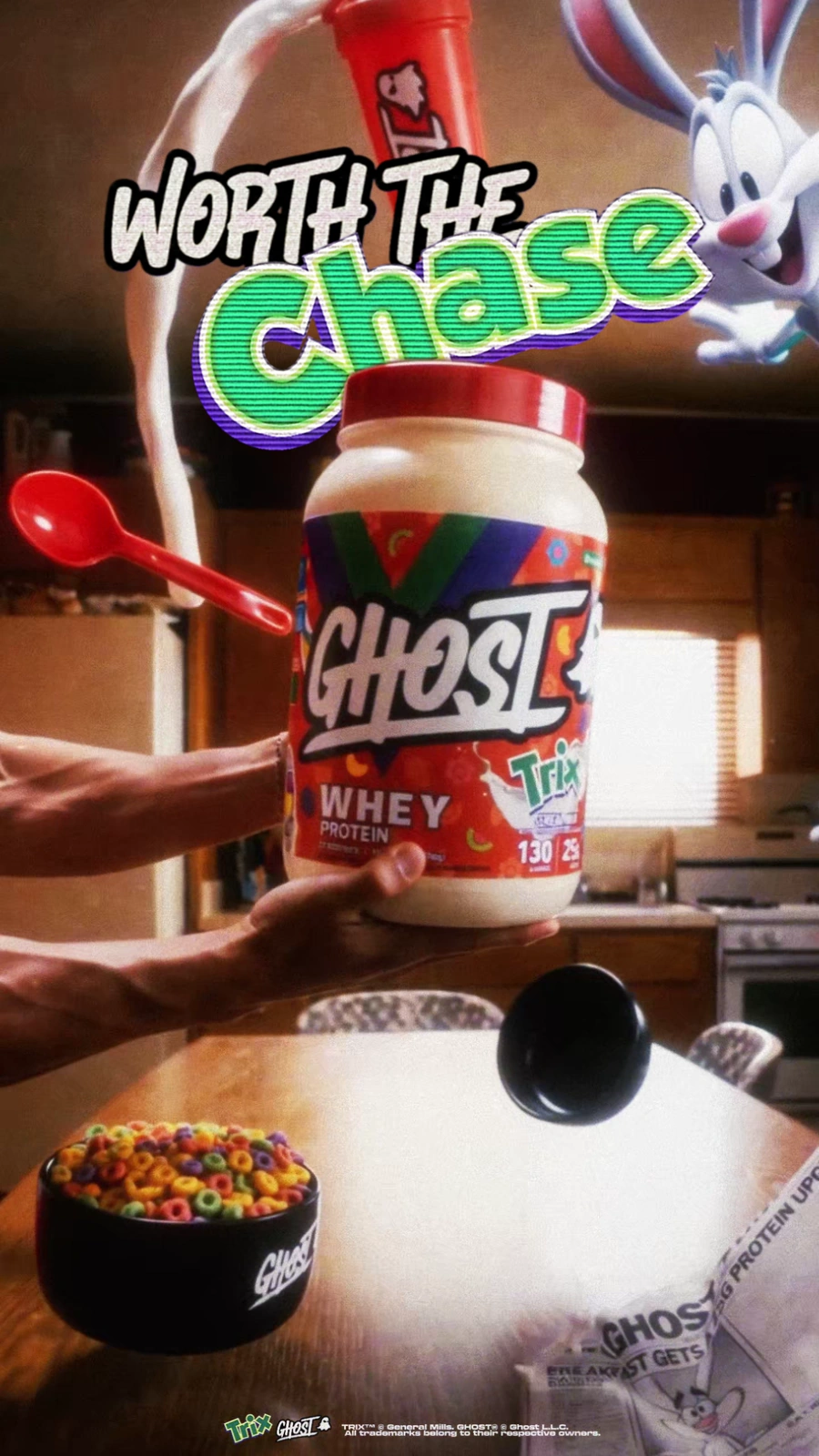 Ghost Whey Protein x Trix tub with the Trix Rabbit, red shaker, cereal bowl and floating spoon in a warm retro kitchen.