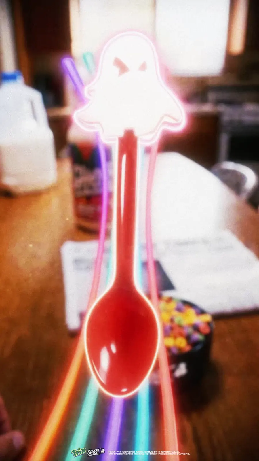 A glowing red spoon streaks across the Ghost x Trix kitchen table toward a bowl of cereal.