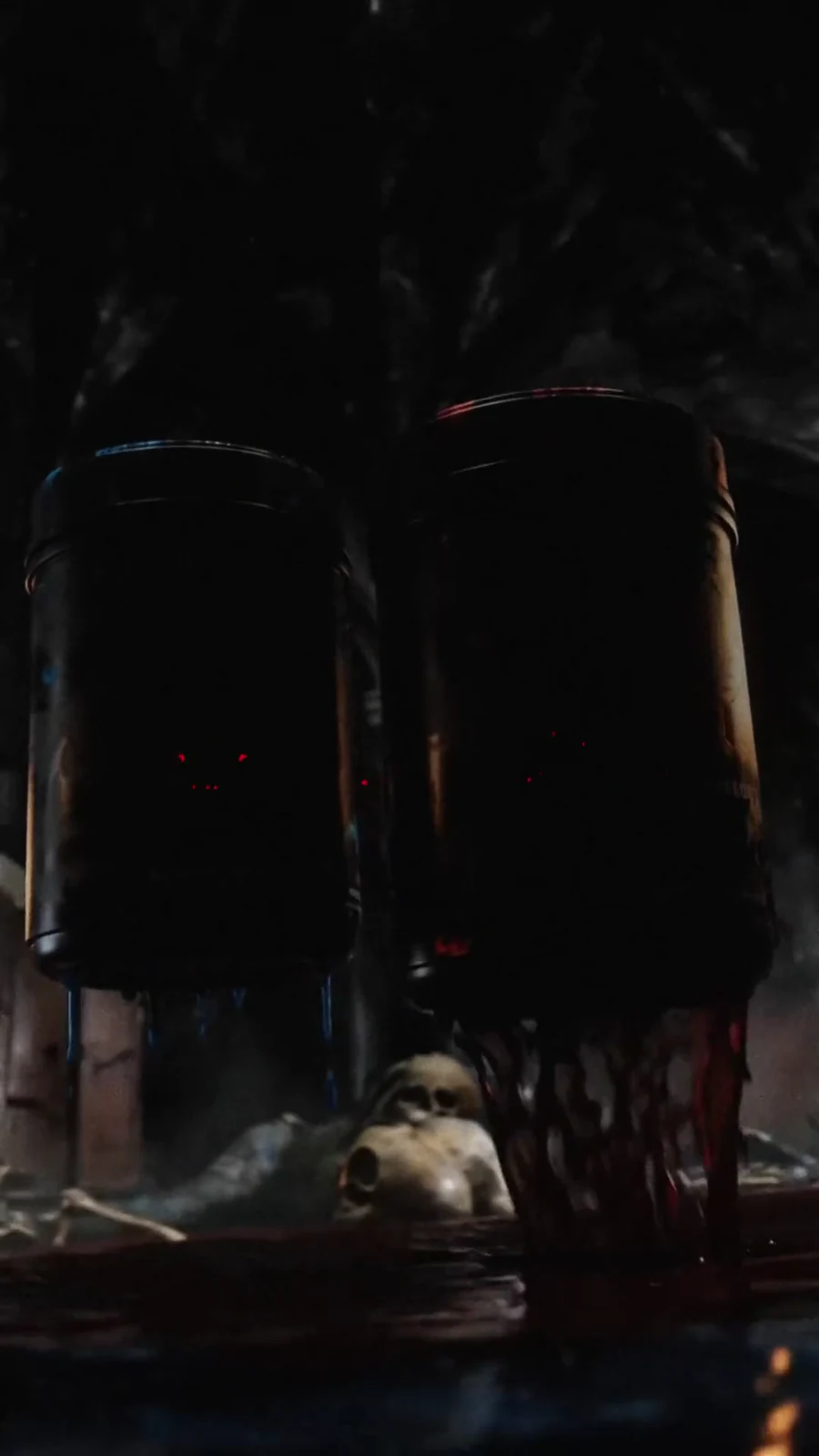 Three black Holy Water tubs stand above liquid and skulls with faint red label marks.