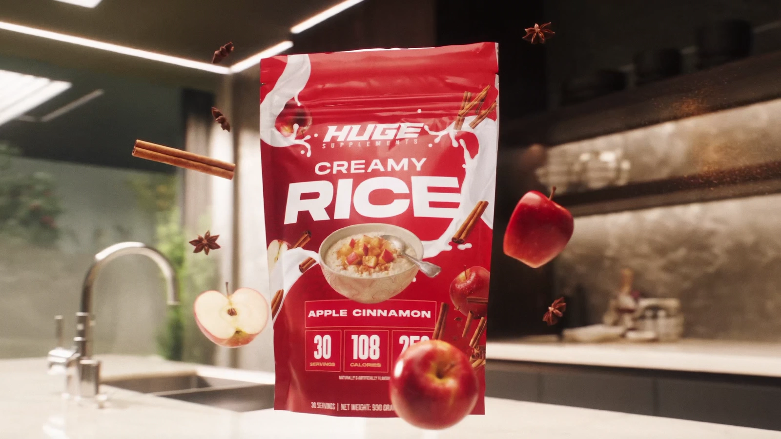 Huge Supplements Apple Cinnamon Creamy Rice bag surrounded by floating apples and cinnamon in a modern kitchen.