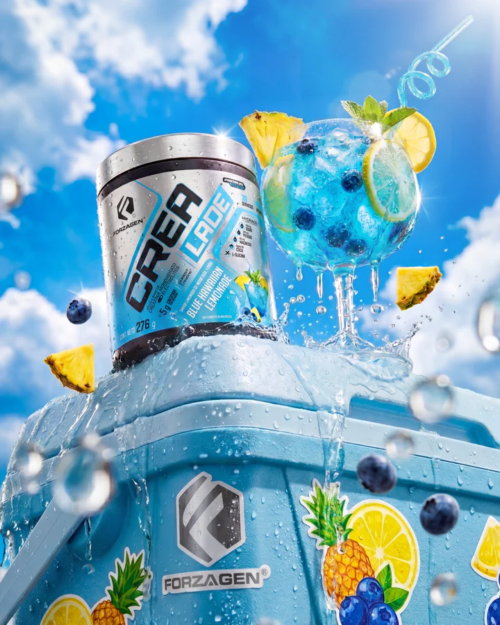 Blue CREA LADE tub and blueberry-citrus drink sit on ice beneath a saturated summer sky.