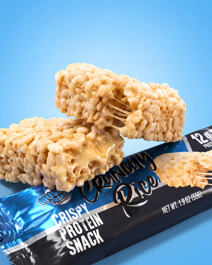 Crunchy Rice wrapper lies behind stacked rice-crisp snack pieces in a tight blue product composition.