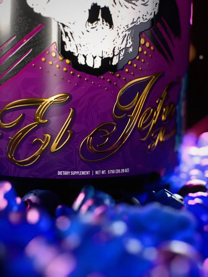 Macro of the gold foil El Jefe script on the magenta label under the skull's jaw.