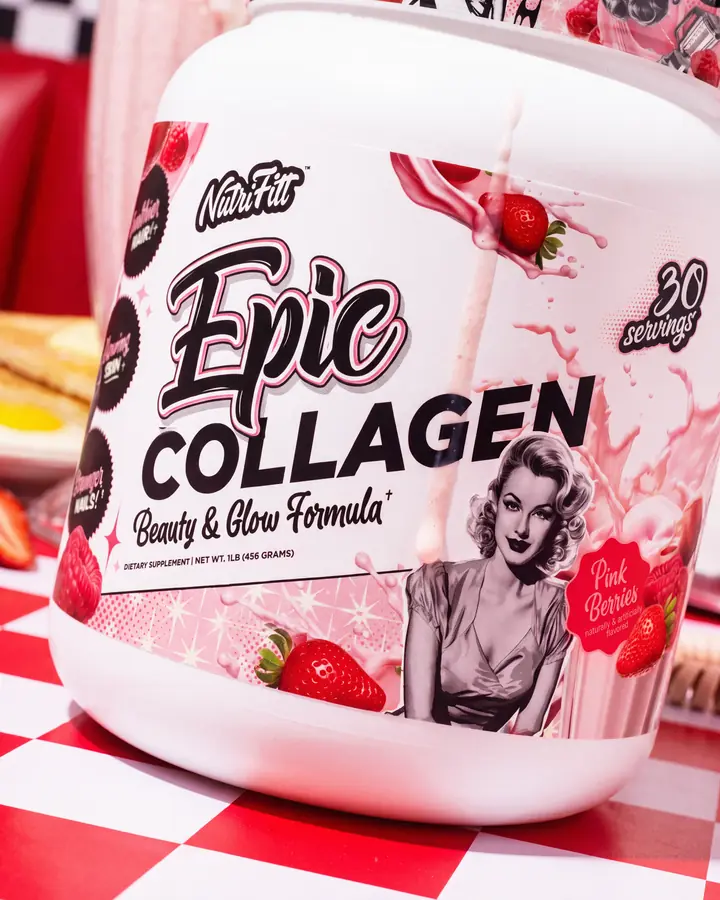 Close product view of NutriFitt Epic Collagen Pink Berries with strawberries, pink cream and a red-and-white diner table.