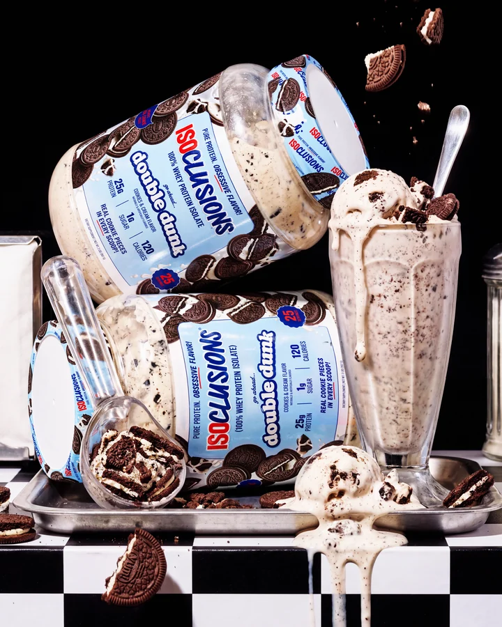 ISOCLUSIONS Two Double Dunk tubs with cookie pieces, ice cream and a cookies-and-cream shake on a diner counter.