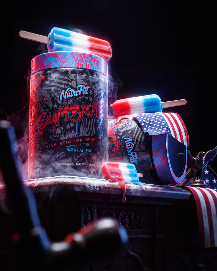 NaviFit Symbiote Merica Pop tub staged with red and blue frozen pops, boxing gloves and an American flag on a dark set.