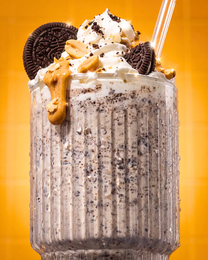 Tall cookies-and-cream Pure Matrix shake with whipped cream and a peanut-butter drizzle.