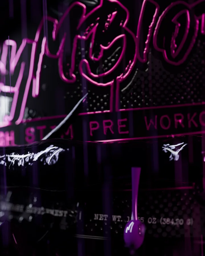 Macro of the Symbiote high stim pre-workout label glowing magenta in the dark.